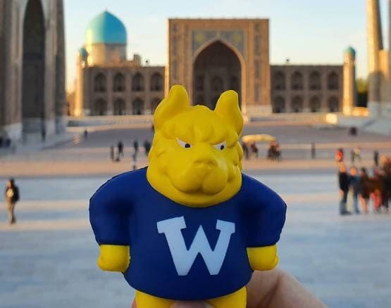 A Gorlok figure in a Webster shirt at the Registan in Samarkand