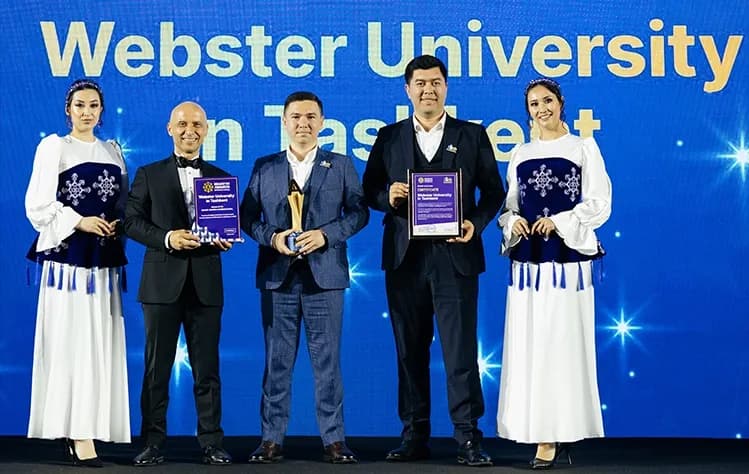 Webster Tashkent employees on stage accepting Brand Award