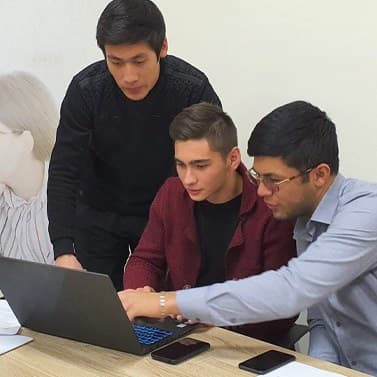 Students working together on a laptop